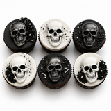 2-cavity skull silicone mold shown with detailed black and white finished skulls for Halloween treats and crafts.