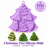 Baking Treasures Bake Shop lavender Christmas tree-shaped silicone mold featuring six decorative Christmas tree cavities with stars, ornaments, and layered designs, displayed with three finished green Christmas tree treats on a white background.