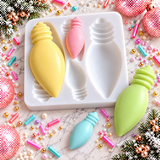 Christmas light bulb silicone mold shown with colorful finished bulb examples in yellow, pink, green and blue for holiday candy and fondant decorations.