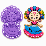Decorated sugar cookie featuring a cute Folklórica Catrina girl with colorful flowers, Día de los Muertos face paint, purple earrings, and a bright blue and pink traditional Mexican dress.