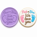 Royal Orchid Lavender "Pink or Blue, We Love You" cookie cutter and embosser with matching decorated gender reveal sugar cookie featuring baby footprints in pink and blue.