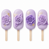 Cakesicles decorated with detailed flowers made using the Rose Garden Silicone Mold