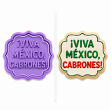 Viva México, Cabrones! plaque cookie cutter with matching embosser displayed beside a decorated sugar cookie featuring green and red lettering on a decorative plaque.