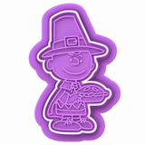 Royal Orchid Lavender Thanksgiving pilgrim holding pie cookie cutter and embosser stamp set with white separation line on white background.