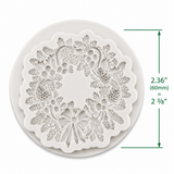 Christmas wreath silicone mold featuring evergreen branches, pinecones, berries and a decorative bow