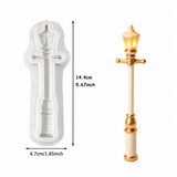 Vintage lamp post silicone fondant mold displayed with finished ivory and gold lamp post decoration