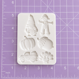 Thanksgiving silicone mold featuring detailed autumn gnome, scarecrow, pumpkin, acorn, truck and turkey
