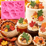 Pink fall silicone mold featuring detailed acorn and autumn leaf cavities with measurement guide for seasonal fondant, chocolate and cake decorations.